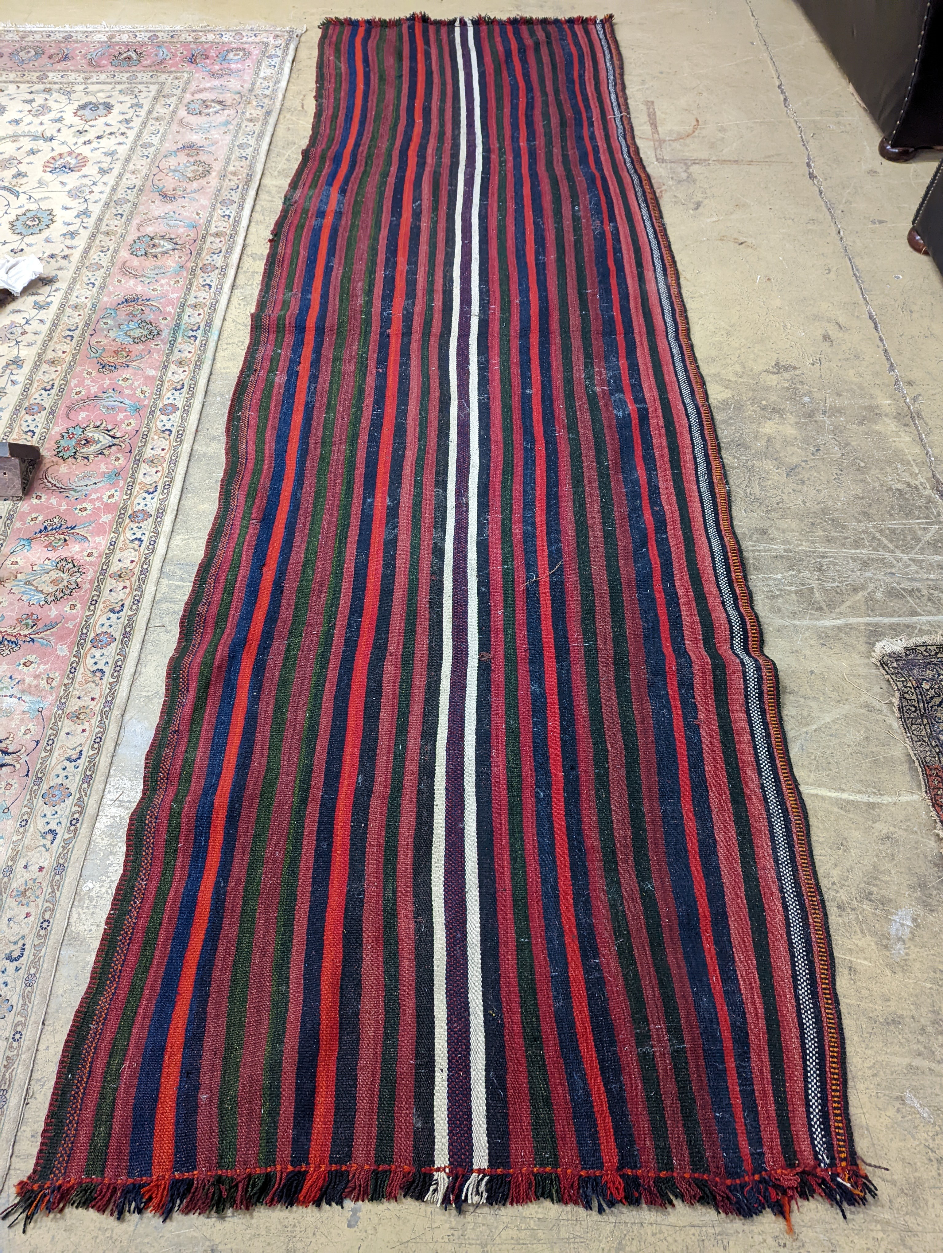 A polychrome flatweave hall carpet, 380 x 124cm